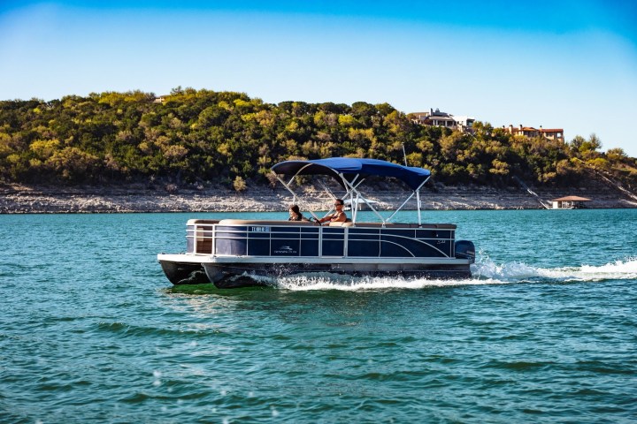 a small boat in a large body of water