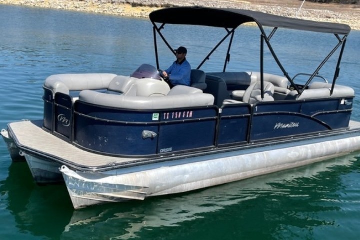 a small boat in a body of water