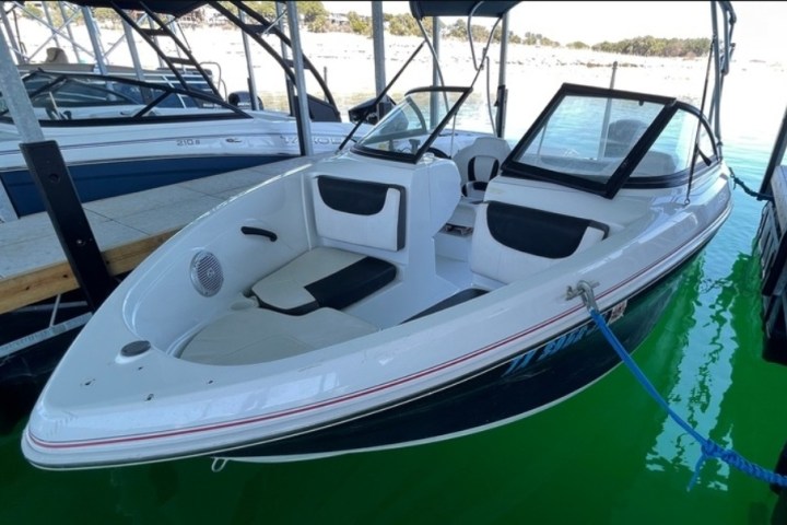 a small boat in a body of water