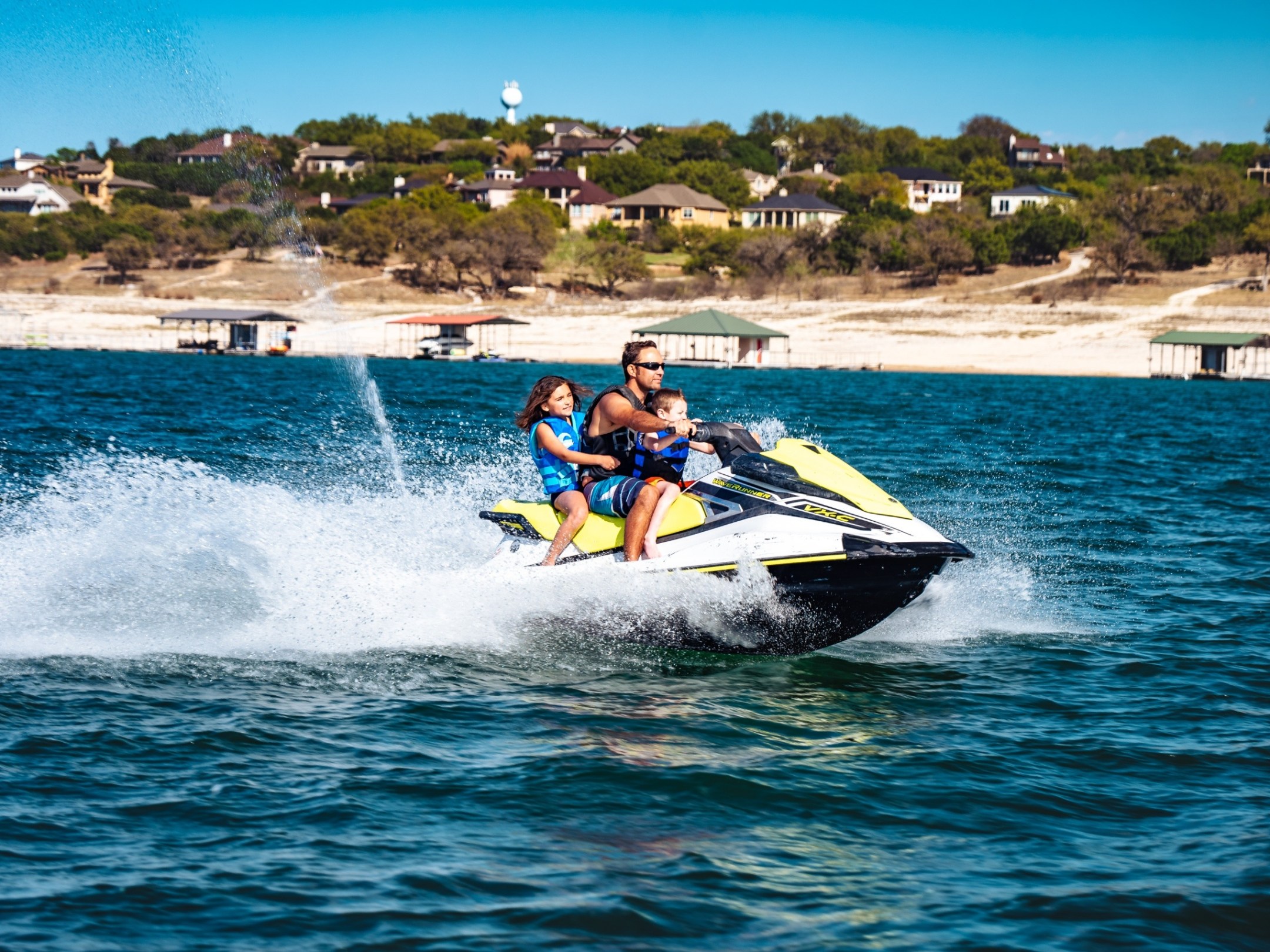 a man water skiing behind a boat