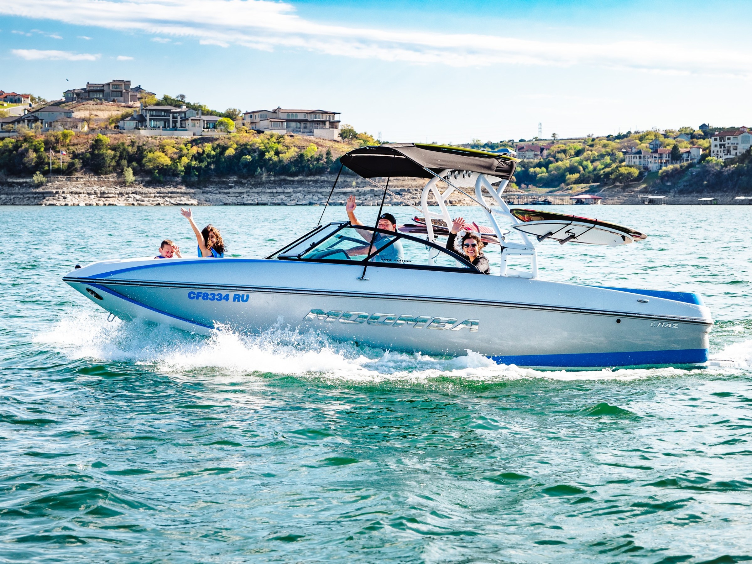 a group of people on a boat in the water