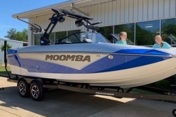a small plane parked on the side of a road