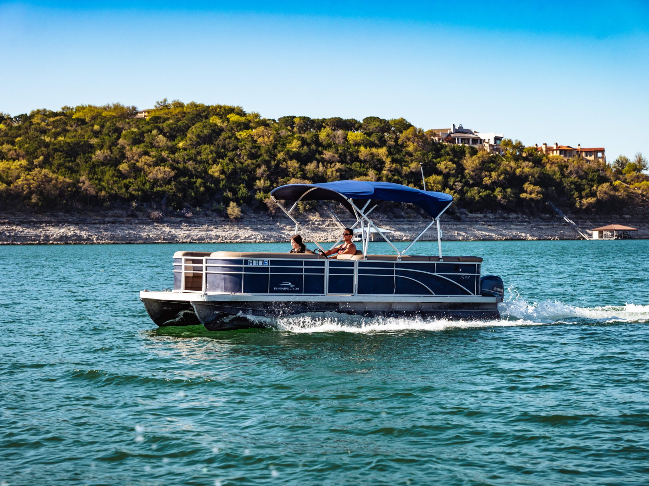 a small boat in a large body of water